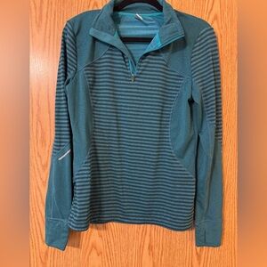 Half zip pull over athletic style and stretchy fabric.